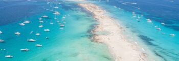 Formentera aerial view of turquoise water and yachts anchored